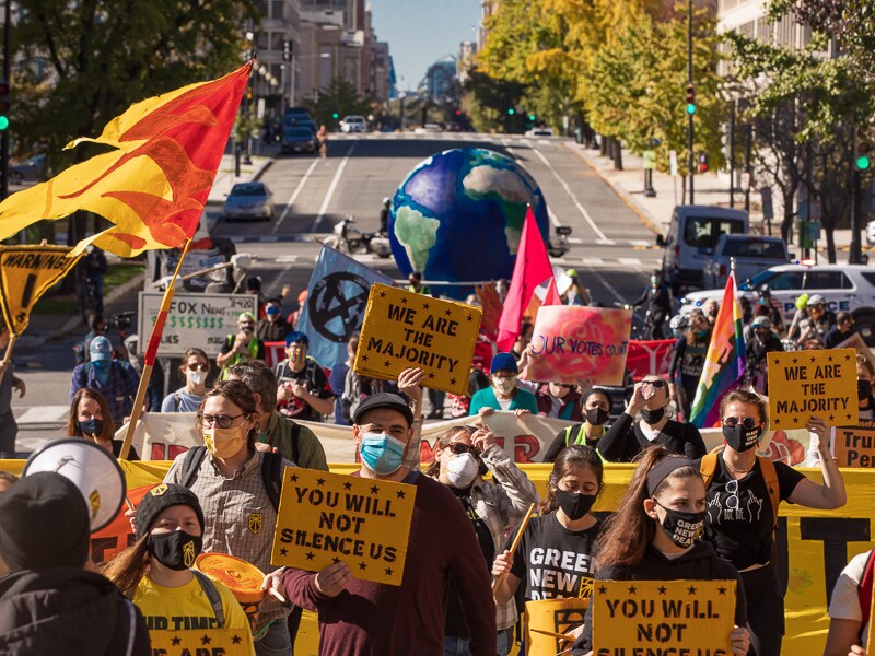 Biden, with powerful allies and foes, targets climate change