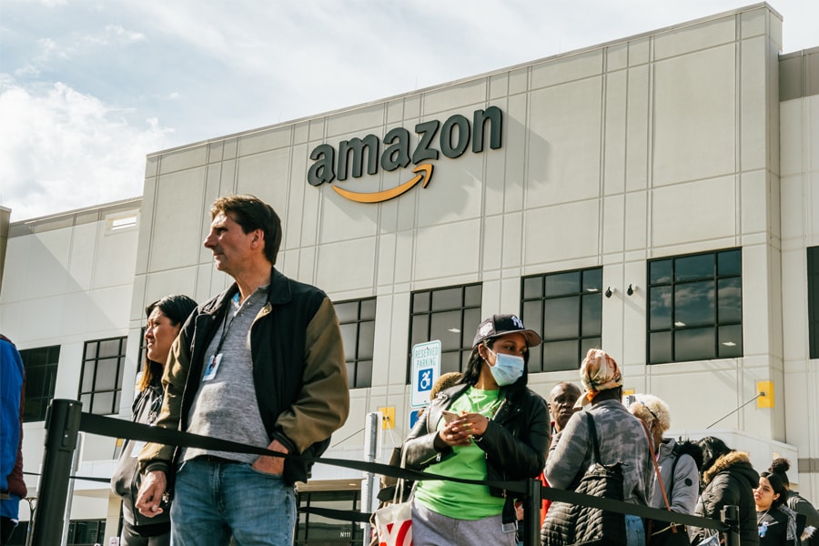 Employees in line to vote on unionization, at Amazon’s JFK8 fulfillment center on Staten Island, March 25, 2022. After the stunning victory at Amazon by a little-known independent union that didn’t exist 18 months ago, organized labor has begun to ask itself: Does the labor movement need to get more disorganized? (DeSean McClinton-Holland/The New York Times)