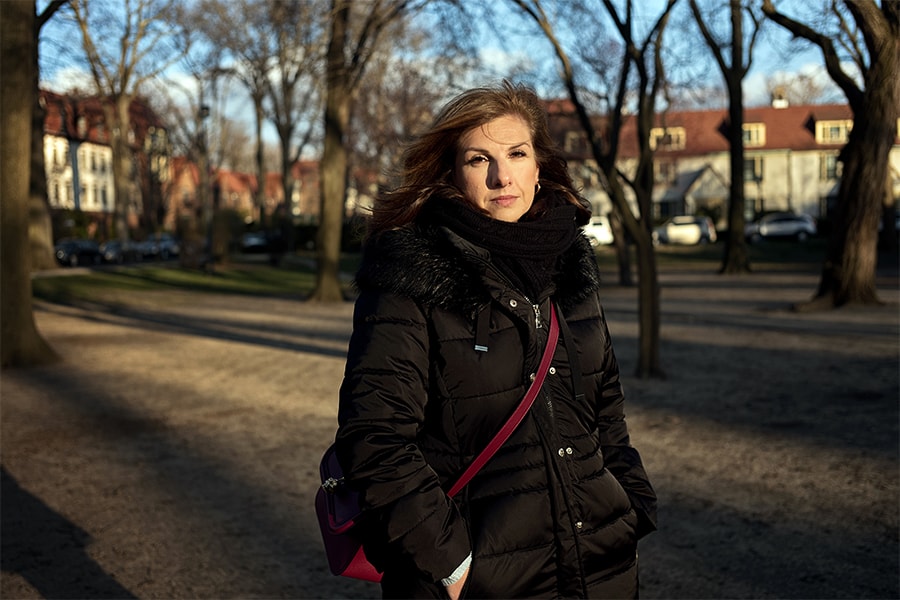 Sasha Krasny near her home in Queens on March 28, 2022. She has been keeping in touch with her 83-year-old aunt, who is living in an apartment in Kharkiv, Ukraine, with blown-out windows. (Misha Friedman/The New York Times)