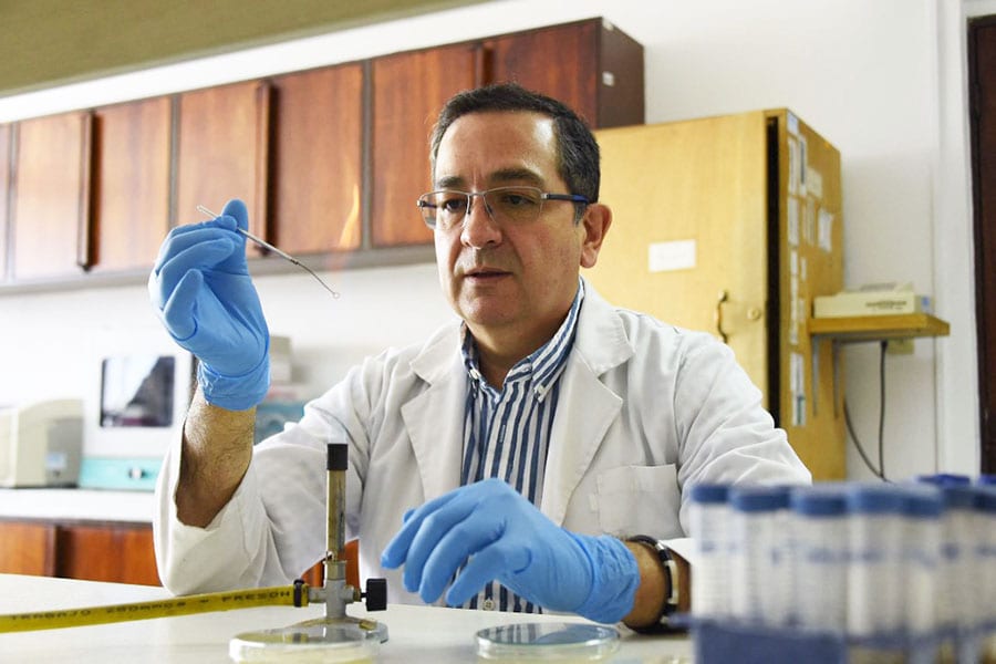 Ecuadorian scientist Javier Carvajal at a laboratory of the Faculty of Exact Sciences of the Pontifical Catholic University of Ecuador in Quito, on July 25, 2022. (Photo by Rodrigo Buendia / AFP)