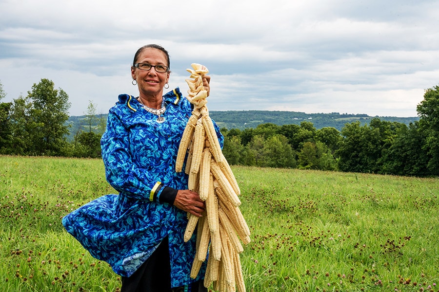 Angela Ferguson, supervisor of the Onondaga Nation Farm and a leader in the Indigenous food sovereignty movement, in South Onondaga, N.Y, on Aug 21, 2022. Through classes, seed banks and plantings, tribes across the United States are reclaiming their agricultural roots, growing healthy foods and aiming for self-sufficiency. Image: Tahila Mintz/The New York Times

