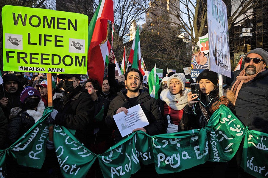 Protesters call on the United Nations to take action against the treatment of women in Iran, following the death of Mahsa Amini while in the custody of the morality police, during a demonstration in New York City. Protesters call on the United Nations to take action against the treatment of women in Iran, following the death of Mahsa Amini while in the custody of the morality police, during a demonstration in New York City.
Image: Yuki Iwamura / AFP 