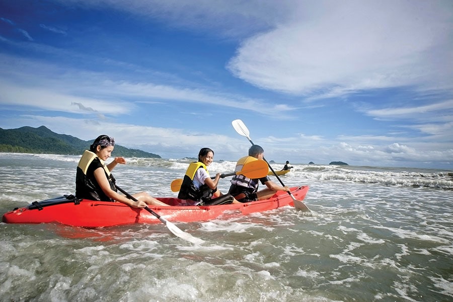 Indians on a kayaking holiday in the Maldives, a magnet for sustainable travel where accomodations are eco-friendly
Image: Shutterstock