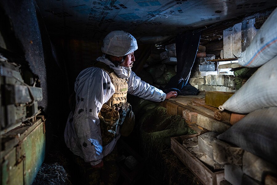 With buildup on land and sea, Russia closes in on Ukraine