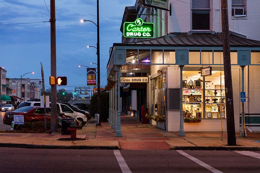 A file photo of a downtown drugstore in the evening in Alabama, United States. 

