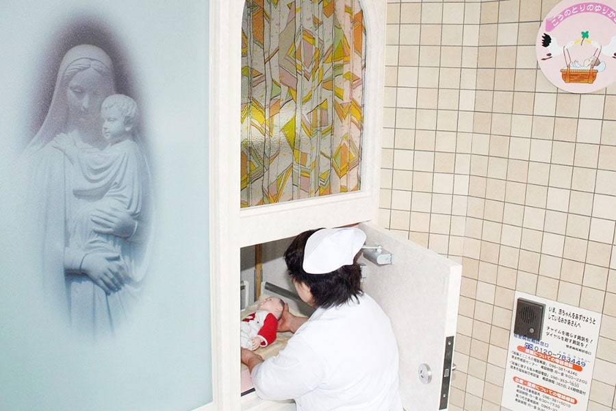 A nurse demonstrates Japan's first 