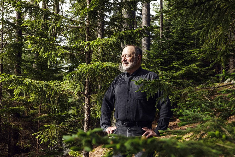 James Bessen, executive director of the Technology & Policy Research Initiative at the Boston University School of Law, at his home in Harpswell, Maine, on June 24, 2022. Bessen wants to see dominant companies pushed to open up, as IBM did when it was pressured to unbundle its software from its hardware business in 1969. (Greta Rybus/The New York Times)