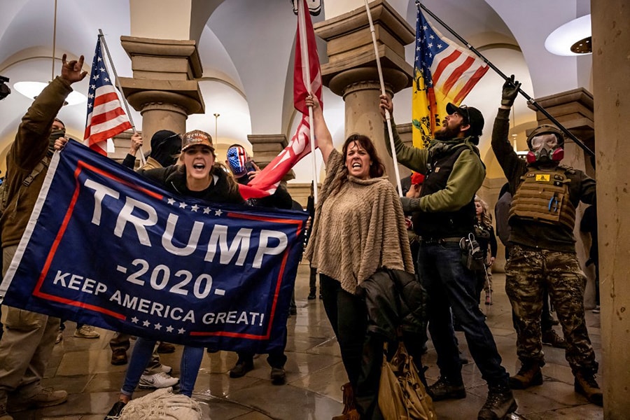 Supporters of US President Donald Trump protest inside the US Capitol on January 6, 2021, in Washington, DC. - Demonstrators breeched security and entered the Capitol as Congress debated the 2020 presidential election Electoral Vote Certification. Image:  Brent Stirton/Getty Images/AFP