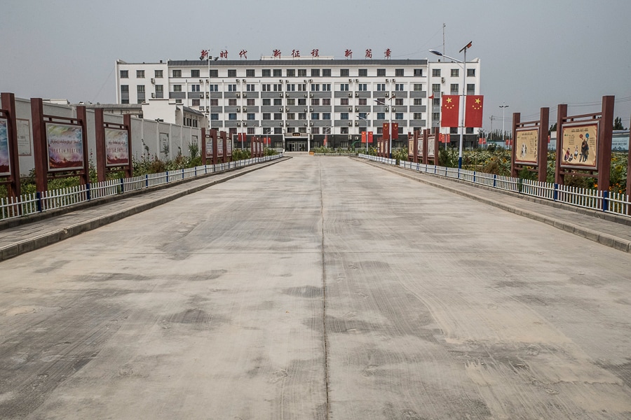   The entrance to an indoctrination center in Hotan, China on Aug. 4, 2019. In 2017, the regional government announced plans to transfer 100,000 people from the cities of Kashgar and Hotan in southern Xinjiang into new jobs. (Gilles Sabrie/The New York Times)