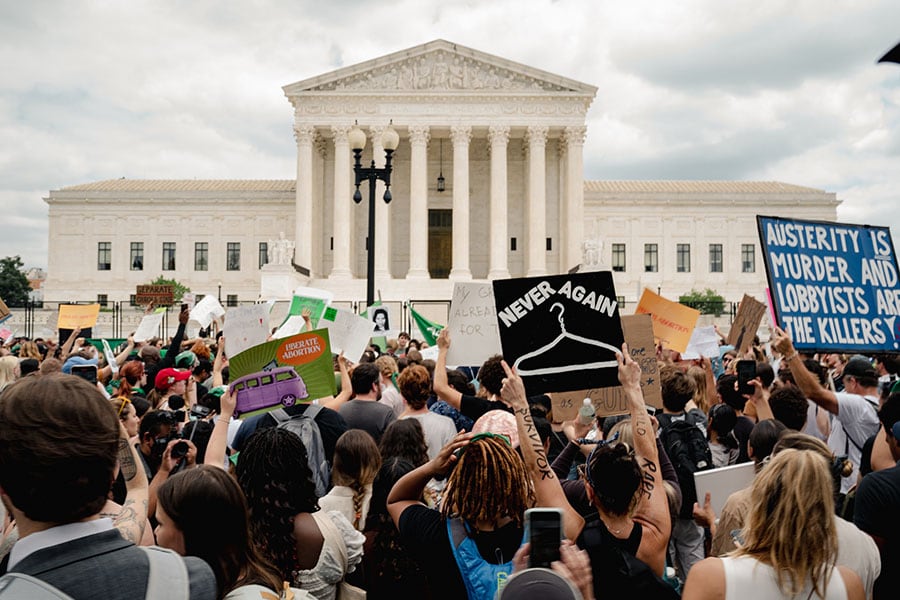 Abortion-rights demonstrators outside the U.S. Supreme Court after Roe v. Wade was overturned, in Washington, June 24, 2022. Reeling from competing demands from stakeholders, including activists, clients, consumers, shareholders and elected officials, businesses are increasingly caught in the middle of the country’s bruising culture wars. (Shuran Huang/The New York Times)