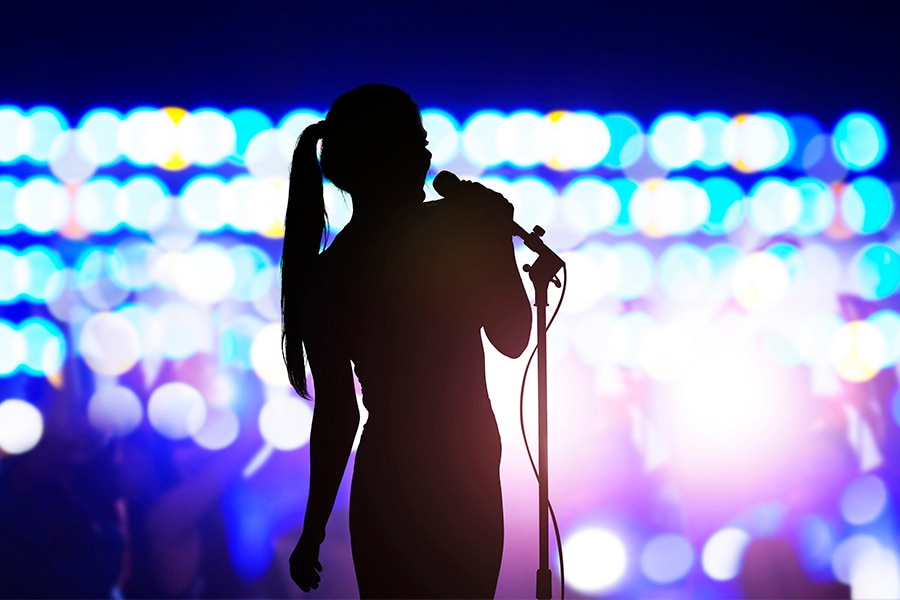 Singing could help improve shortness of breath in people with long Covid. (Credits: FangXiaNuo / Getty Images)

