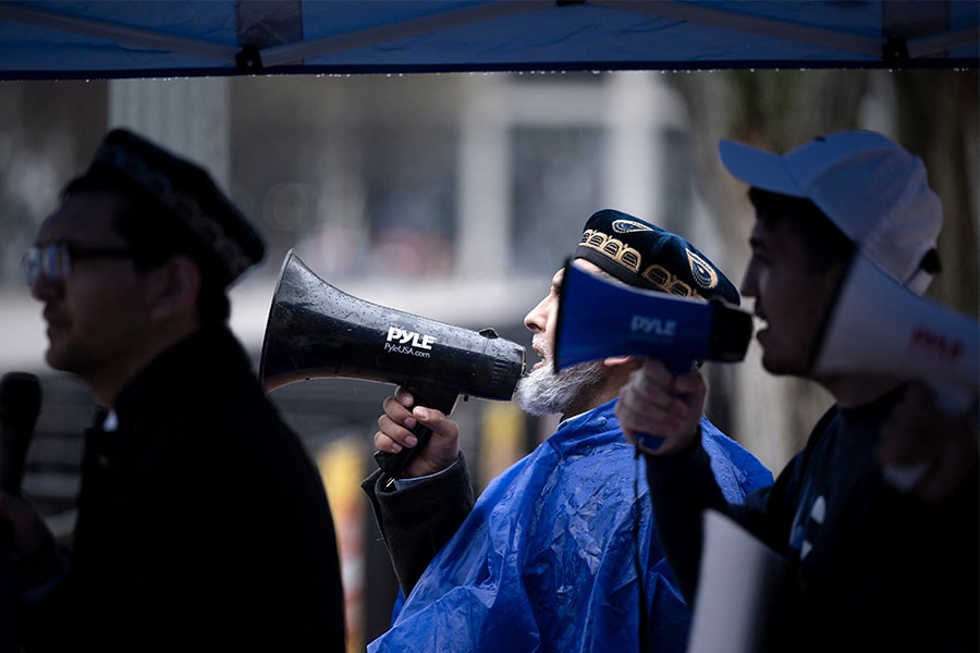 Activists organized by the East Turkistan National Awakening Movement and the East Turkistan Government in Exile protest the treatment of Uyghurs by the Chinese government during a rally outside the White House in Washington, DC.​ (Credits: Brendan Smialowski / AFP​)