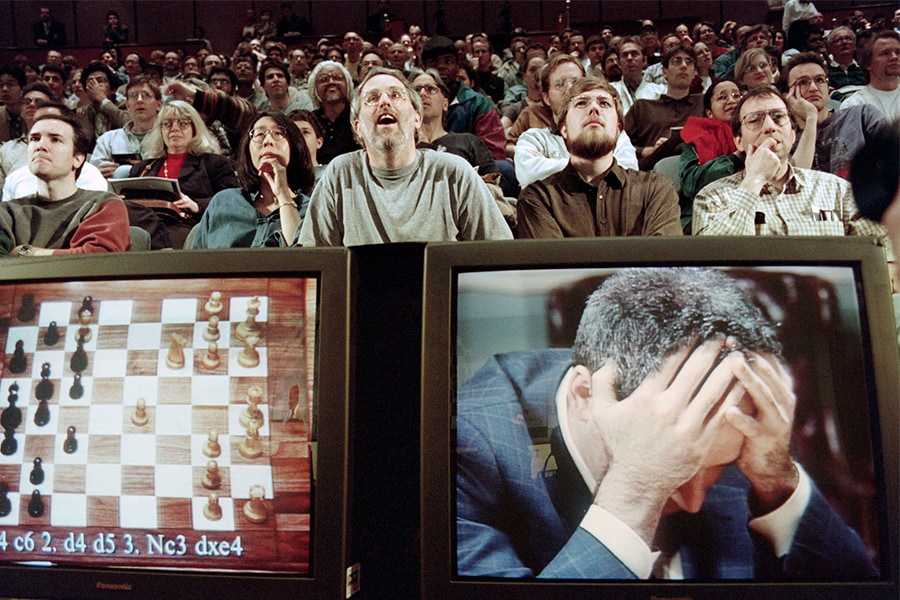 On May 11, Garry Kasparov shot a final dark glance at the chessboard before storming out of the room: the king of chess had just been beaten by a computer. Image: Stan Honda/ AFP