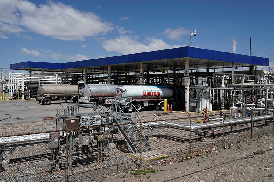 rucks line up to fill their tankers with gas and diesel to deliver to stations at Marathon Refinery on May 24, 2022 in Salt Lake City, Utah. S oil and gas firms took advantage of energy worries over the Ukraine war to push their fossil fuel products and resist climate change regulatory measures, an analysis showed on Wednesday.