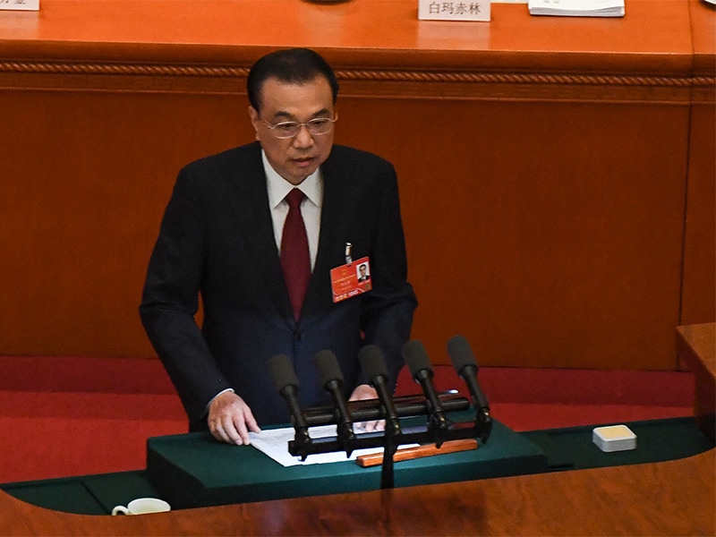 China premier issues warning on Covid-hit economy