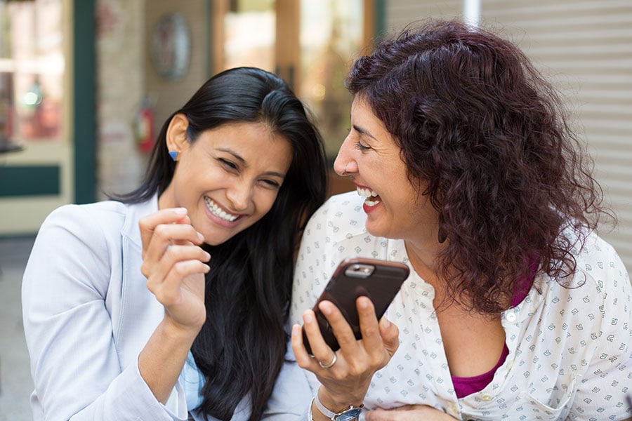 Laughter is a crowd favourite for its ability to create shared realities and strong in-groups. Image: Shutterstock  