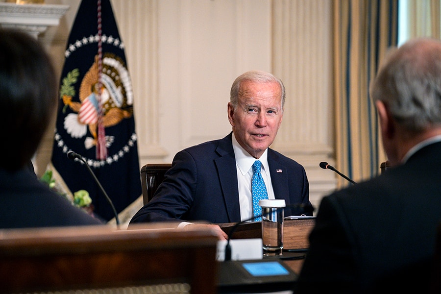 President Joe Biden leads a meeting at the White House on Sept. 26, 2022. Biden has pledged to bring down federal budget deficits by <img trillion over a decade. (Pete Marovich/The New York Times)