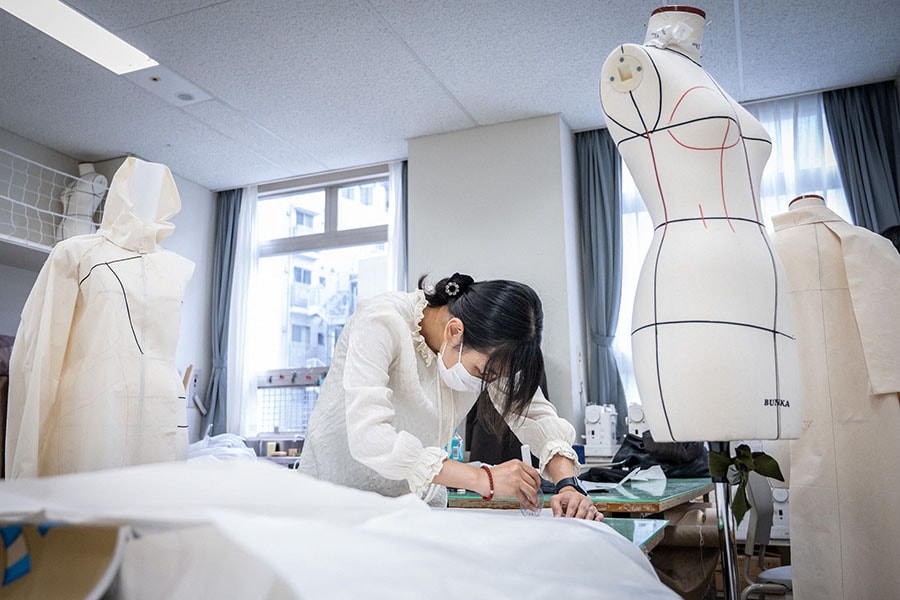 
A student making a design during class at Bunka Fashion College in Tokyo
Image: Yuichi Yamazaki / AFP 