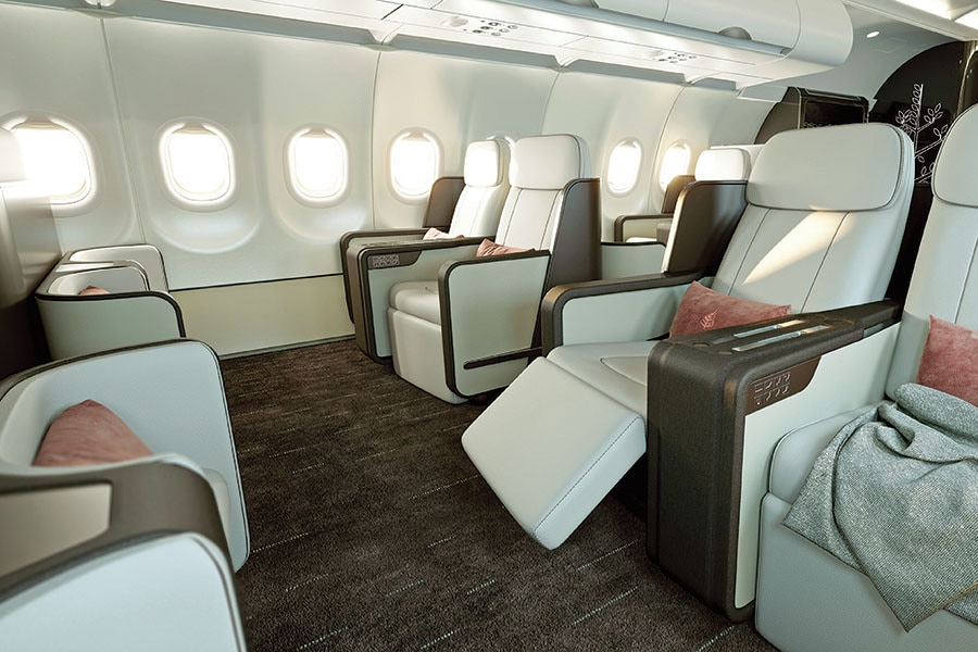 Meal service onboard an Abercrombie & Kent tour; interior of an Abercrombie & Kent private jet Interior