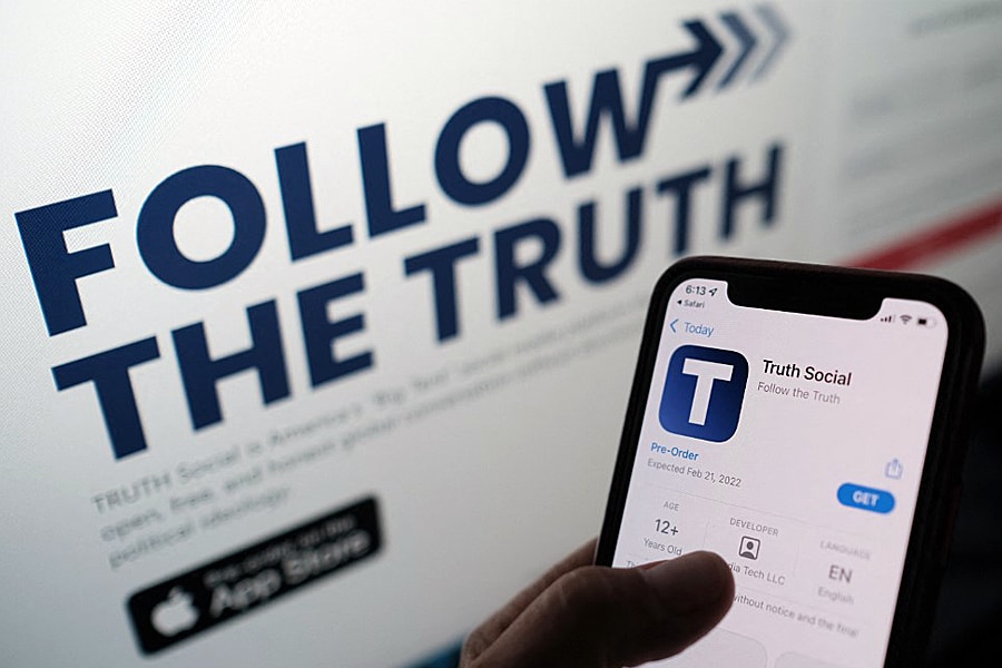 Former US president Donald Trump's Truth Social app is unwelcome in Google's app store until it abides by rules regarding content moderation including violent threats, the company said August 31, 2022. Image: Chris Delmas/AFP 