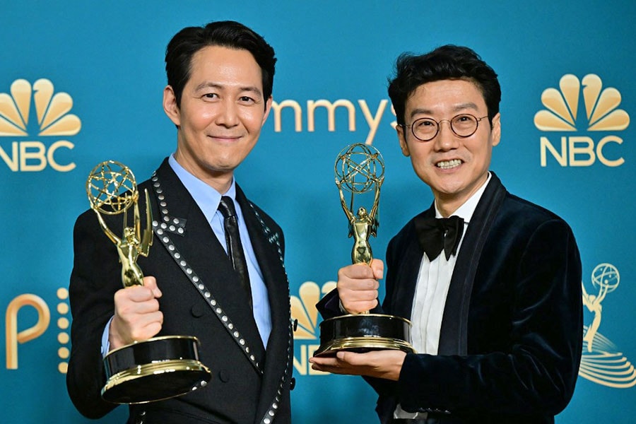 South Korean actor Lee Jung-jae (L) poses with the award for Outstanding Lead Actor In A Drama Series and South Korean director Hwang Dong-hyuk (R) with the Emmy for Outstanding Directing For A Drama Series for 