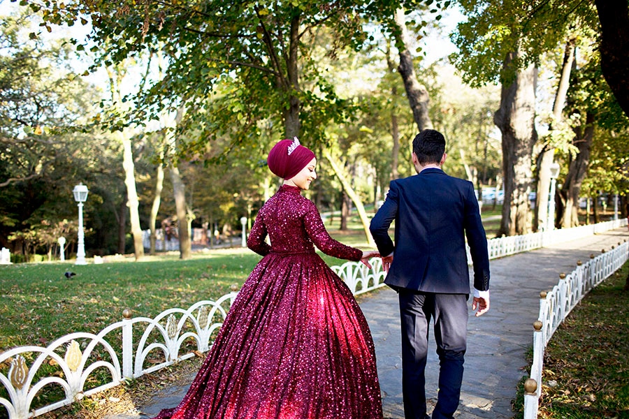 A couple explores the gardens at Hidiv Kasri as they take photos for their upcoming wedding, in Istanbul in November 2019. Image: Danielle Villasana/The New York Times