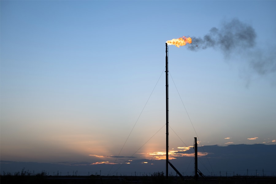 A flare in the Permian Basin in Coyanosa, Texas, on Aug. 12, 2020. Methane is a stronger, though shorter-lived, greenhouse gas than carbon dioxide. (Jessica Lutz/The New York Times)