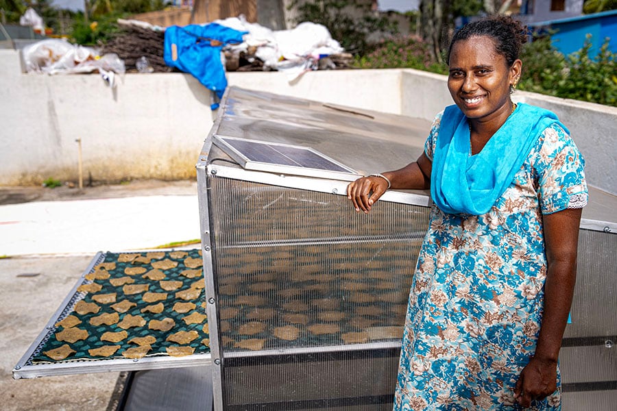 Ramya Kumar has been using the solar-powered milking machine for the last two years now. Earlier, milking the cows manually would take 30 minutes, now it only takes 5 minutes to milk each cow with this machine; Image: Selvaprakash Lakshmanan for Forbes India