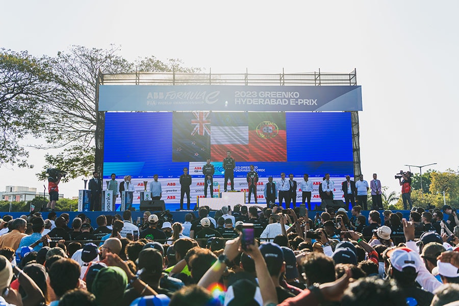 Jean-Eric-Vergne of France DS Penske driver, Nick Cassidy of New Zealand Envision Racing driver, Antonio Felix da Costa of Portugal Porsche driver on podium during the Hyderabad E-Prix on February 11, 2023 in Hyderabad, India. Image: Akhil Puthiyedath ATPImages/Getty Images)