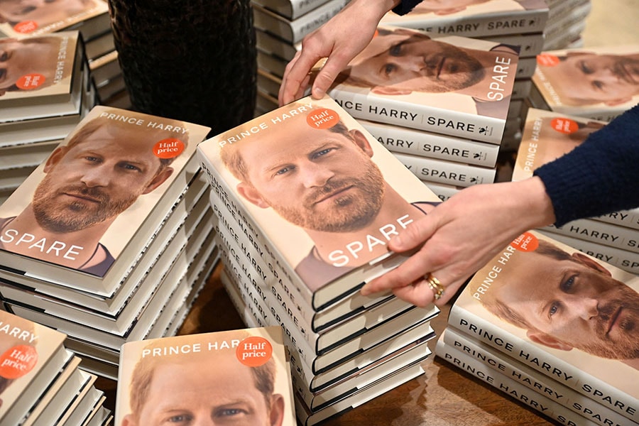 At a bookshop in London's Victoria train station, workers pulled fresh copies of the book from their packaging at the stroke of midnight
Image: Justin Tallis / AFP 