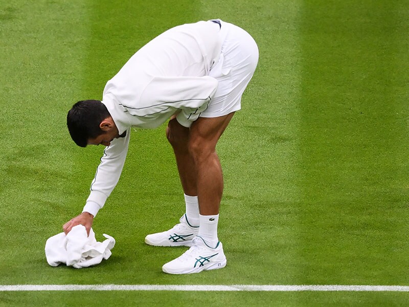 Photo of the day: Novak Djokovic 'wipes the court'