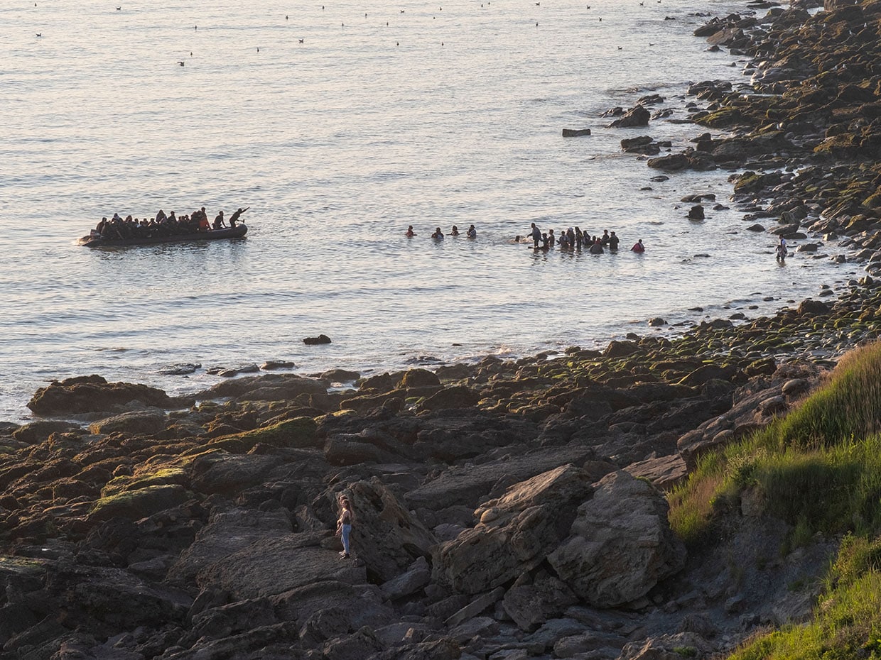 Illegal Migrants attempt to flee to the UK aboard an inflatable rubber dinghy on June 10, 2023, in Equihen-Plage, France.