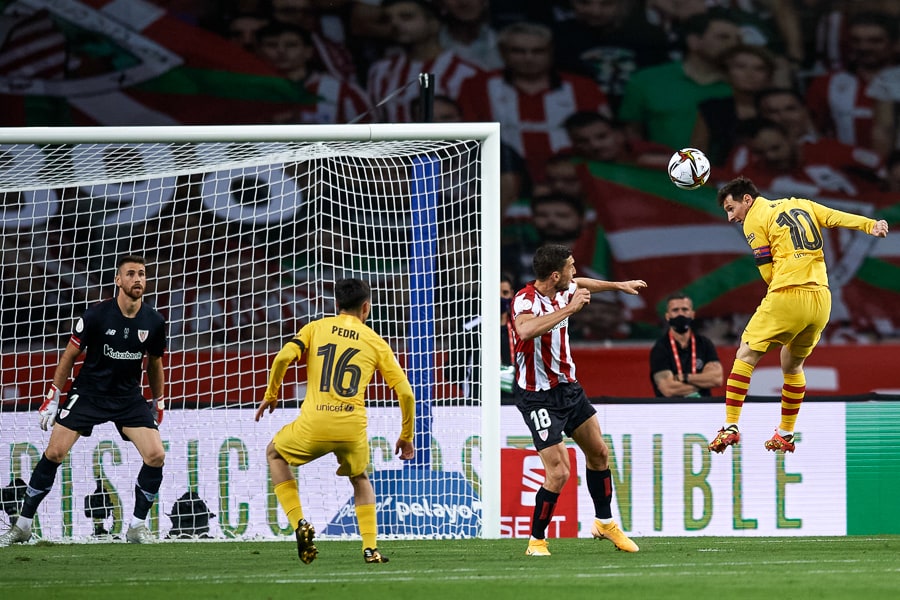 Lionel Messi of Barcelona FC heads a goal during the Copa del Rey final match against Athletic Club Bilbao on April 17, 2021, in Seville, Spain.