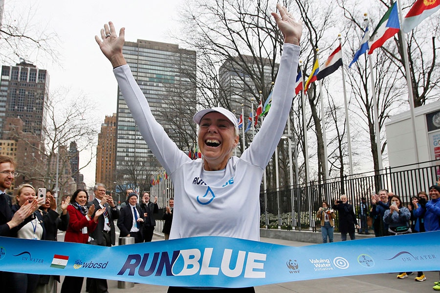 Australian water scarcity activist Mina Guli completes her 200th marathon outside UN headquarters, ahead the UN Water Conference, on March 22, 2023 Image: Leonardo Munoz/ AFP 