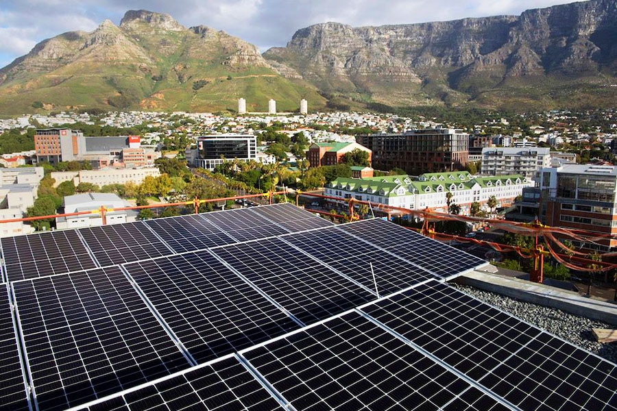 A general view of solar panels on top of the Hemp Hotel in Cape Town on April 25, 2023. Image: Photography RODGER BOSCH / AFP