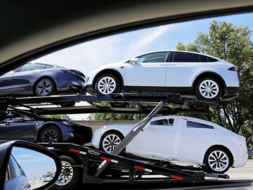 Morning Buzz: India working to fast-track Tesla approvals, Adani may invest $1.5 billion in Dharavi and more
