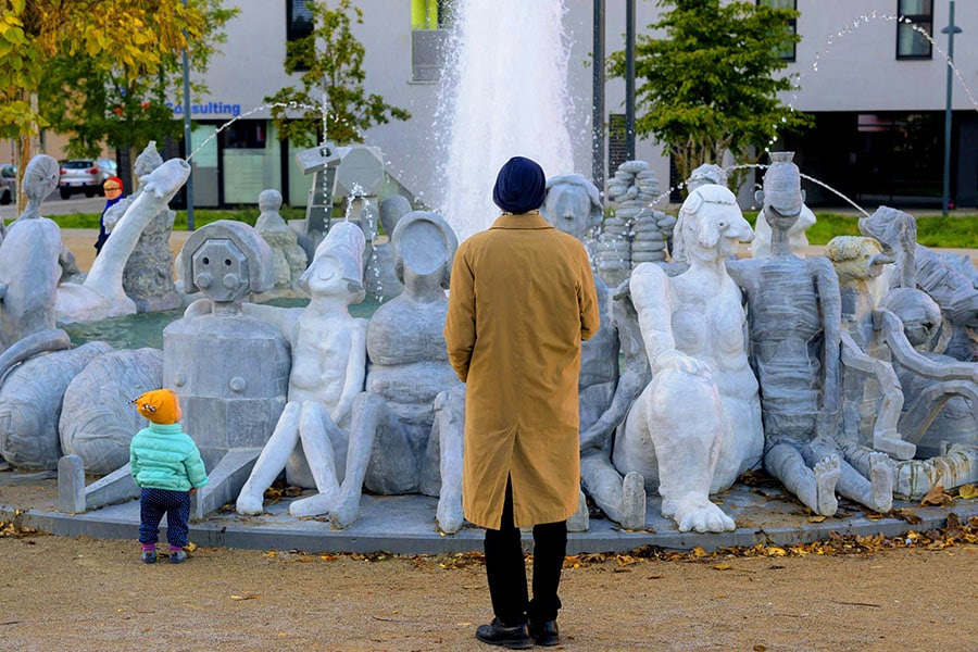 The unusual fountain—featuring 33 humanoid sculptures seated in a circle—was created by the provocative Viennese artist group Gelitin after their design symbolising the 