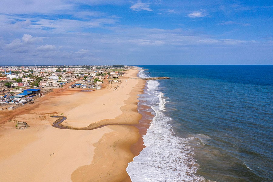 This aerial view shows the coastline of a beach east of Cotonou on October 23, 2023. 
Image: Yanick Folly / AFP 