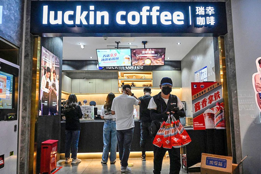 A collaboration between coffee chain Luckin and distiller Kweichow Moutai mixes milky coffee with a flavouring based on a traditional firewater that is around 50 percent alcohol.
Image: Jade Gao / AFP 