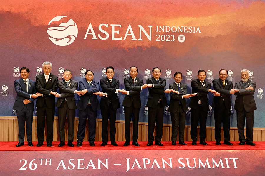 (L-R) Philippines' President Ferdinand Marcos Jr., Singapore's Prime Minister Lee Hsien Loong, Thailand's Permanent Secretary of the Ministry of Foreign Affairs Sarun Charoensuwan, Vietnam's Prime Minister Pham Minh Chinh, Japan's Prime Minster Fumio Kishida, Indonesian President Joko Widodo, Laos' Prime Minister Sonexay Siphandone, Brunei's Sultan Hassanal Bolkiah, Cambodia's Prime Minister Hun Manet, Malaysian Prime Minister Anwar Ibrahim and East Timor's Prime Minister Xanana Gusmao pose for a family photo during the start of the ASEAN-Japan Summit as part of the 43rd ASEAN Summit in Jakarta on September 6, 2023. (Photo by WILLY KURNIAWAN / POOL / AFP)