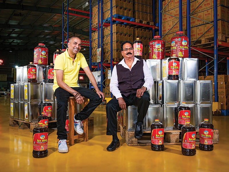 
 (From left) Ashish Khandelwal, managing director, and Ghanshyam Khandelwal, chairman of BL Agro at the Bail Kolhu packaging plant in Bareilly
Image: Amit Verma