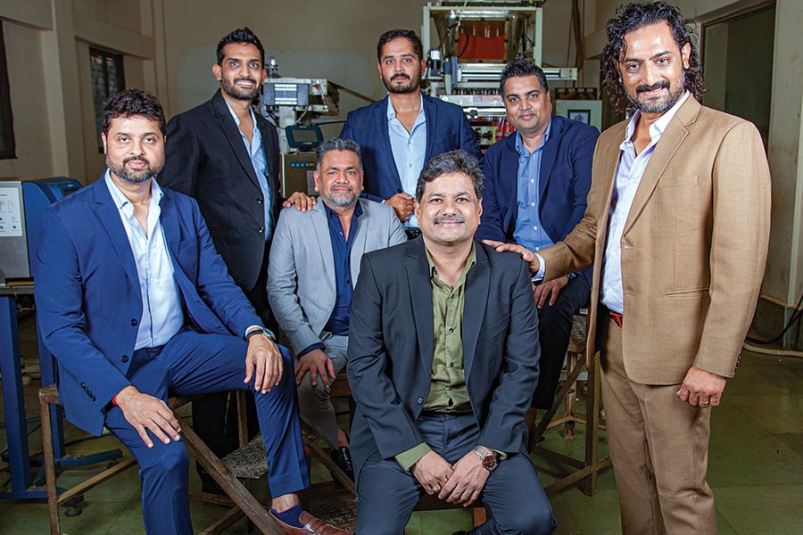 The third generation: (Front row, left to right) Vijay Jain, Rakesh Jain, Mukesh Jain and Amit Jain. (Behind them, left to right) Sumit Jain, Vikash Jain and Vinod Jain
Image: Subrata Biswas for Forbes India