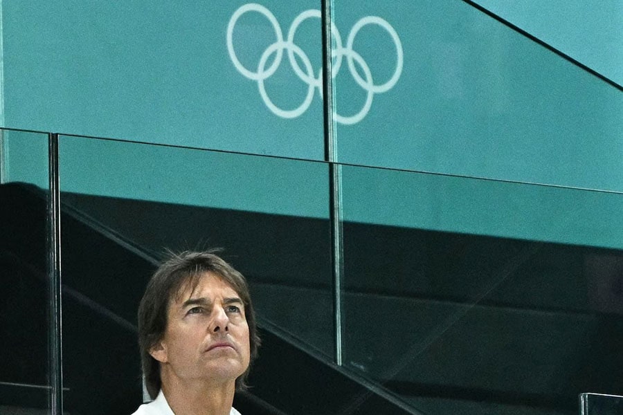 US actor Tom Cruise at the artistic gymnastics women's qualification during the Paris 2024 Olympic Games at the Bercy Arena in Paris, on July 28, 2024. 
Image: Lionel Bonaventure / AFP©