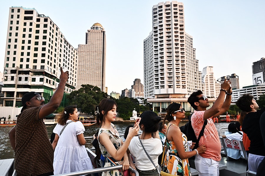  Thailand has launched a scheme to offer visitors up to ,000 in medical coverage in the event of an accident. 
Image: Lillian Suwanrumpha / AFP©