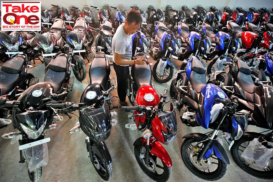  
File Photo: A worker cleans a Bajaj motorcycle at a Bajaj Auto showroom in Kolkata, India.
Image: REUTERS/Rupak De Chowdhuri /File Photo