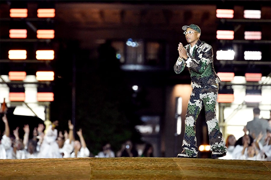 Pharrell Williams makes his second outing at Paris Fashion Week on Tuesday following his debut for Louis Vuitton last summer when he took over the entire Pont Neuf bridge, painted it gold and packed it with A-listers. 
Image: Julien De Rosa  / AFP©