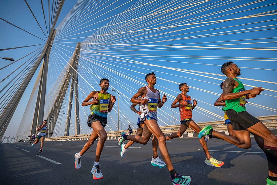 Athletes run on Bandra-Worli sea link bridge as they take part in a marathon on January 21, 2024 in Mumbai, India.
Image: Satish Bate/Hindustan Times via Getty Images