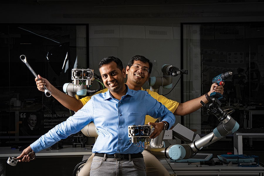 Co-founders of CynLr Nikhil Ramaswamy (in blue) and Gokul NA
Image: Selvaprakash Lakshmanan for Forbes India