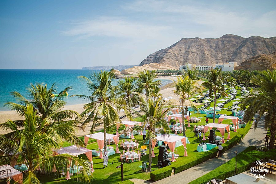 Oman's rugged mountains and pristine beaches offer a stunning backdrop for exchanging vows. Courtesy - Shaadi Squad, Photography - The Wedding Salad