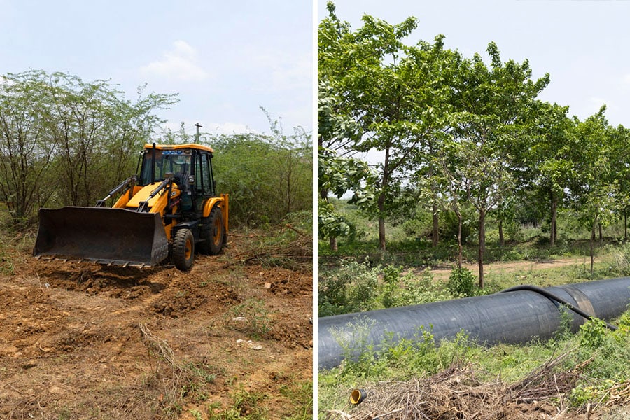 Abandoned half-constructed buildings on farmland, where two types of crops were grown a year, with dug-up approach roads lined on either side with weeds and thickets. Image: Vikas Chandra Pureti for Forbes India